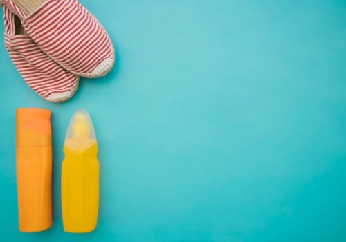 summer-composition-with-lotions-shoes